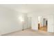 Bright bedroom with neutral walls and access to the bathroom and walk-in closet at 636 Nuttal St, Westfield, IN 46074