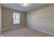 Spacious bedroom with neutral walls and carpet flooring at 10808 Inspiration Dr, Indianapolis, IN 46259