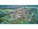 Aerial view of neighborhood with various houses and yards at 120 S Elma St, Anderson, IN 46012