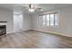 Living room featuring bay window and ceiling fan at 120 S Elma St, Anderson, IN 46012