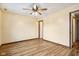 Simple bedroom with ceiling fan and hardwood floors at 12389 N Navajo Ct, Camby, IN 46113