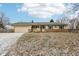 Ranch home with stone accents and a two-car garage at 12389 N Navajo Ct, Camby, IN 46113