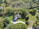 Bird's-eye view of the property, showing its setting in a wooded area at 13829 N Gray Rd, Carmel, IN 46033