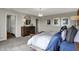 Main bedroom featuring a king bed and walk-in closet access at 1468 Covington Blvd, Franklin, IN 46131