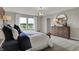 Main bedroom with king bed, large windows, and a dresser at 1468 Covington Blvd, Franklin, IN 46131