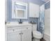 Updated bathroom with white vanity, and new flooring at 1535 N Glen Arm Rd, Indianapolis, IN 46214