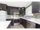 Modern kitchen with stainless steel appliances and quartz countertops at 1535 N Glen Arm Rd, Indianapolis, IN 46214