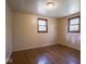 Bright bedroom featuring hardwood floors and two windows at 2290 Wilbur Rd, Martinsville, IN 46151