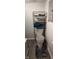 Toilet and shelving unit in small bathroom at 2914 Collier St, Indianapolis, IN 46241