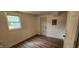 Versatile bedroom with exterior access and updated flooring at 2914 Collier St, Indianapolis, IN 46241