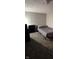 Small bedroom with double bed and gray carpet at 2914 Collier St, Indianapolis, IN 46241
