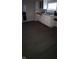 Simple kitchen with white cabinets and gray floor at 2914 Collier St, Indianapolis, IN 46241