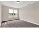 Bright bedroom with large window and plush carpet at 320 N Bur Oak Dr, Mooresville, IN 46158