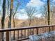 Deck with chairs offering scenic wooded views at 3499 Raspberry Ln, Nineveh, IN 46164