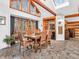 Bright dining area with a wooden table and access to a wet bar at 3499 Raspberry Ln, Nineveh, IN 46164