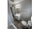 Updated bathroom with vanity, toilet, and bathtub at 3771 Creston Dr, Indianapolis, IN 46222