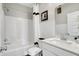 Clean bathroom with white vanity, shower, and bathtub at 4104 Jacoby Pl, Indianapolis, IN 46268