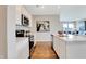 Modern kitchen with white cabinets, stainless steel appliances and an island at 4104 Jacoby Pl, Indianapolis, IN 46268