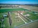 Aerial view of a property, showing the house and surrounding landscape at 4450 W 300 N, Fairland, IN 46126