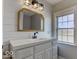 Bathroom with white vanity and shiplap wall at 4450 W 300 N, Fairland, IN 46126