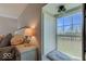 Bedroom with window seat and a view of the landscape at 4450 W 300 N, Fairland, IN 46126