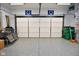 Two-car garage with white doors and Colts decor at 5060 Dunewood Way, Avon, IN 46123