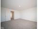 Spacious, empty bedroom with neutral carpet and white walls at 5553 Tart Blvd, Indianapolis, IN 46239