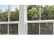 White framed window looking out to backyard at 6813 W Buck Stone Dr, McCordsville, IN 46055