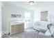 Charming Bedroom featuring a crib, changing table, and ample natural light at 6839 W Buck Stone Dr, McCordsville, IN 46055