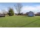 Spacious backyard with shed and deck at 8909 Maple Hill Dr, Indianapolis, IN 46239