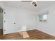 Hardwood floor bedroom with a closet and window at 8909 Maple Hill Dr, Indianapolis, IN 46239