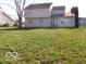 Spacious backyard with large grassy area at 10604 Creekside Woods Dr, Indianapolis, IN 46239