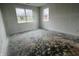 Bright bedroom with two windows and new flooring at 1390 Foxtail Ln, Greenwood, IN 46143