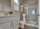 Bathroom with white vanity, toilet, and shower at 14334 Beaument Blvd, Carmel, IN 46074