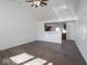 Spacious living room with high ceilings and dark hardwood floors at 215 E Harrison St, Mooresville, IN 46158