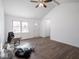 Living room with hardwood floors and access to front door at 215 E Harrison St, Mooresville, IN 46158