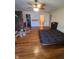 Main bedroom with hardwood floors and access to bathroom at 230 S Central St, Atlanta, IN 46031