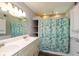 Bright bathroom with double vanity and shower at 3060 S Shortridge Rd, Indianapolis, IN 46239