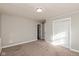 Spacious bedroom with neutral walls and double door closet at 3060 S Shortridge Rd, Indianapolis, IN 46239