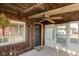 Inviting front porch with screen enclosure at 3060 S Shortridge Rd, Indianapolis, IN 46239