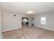 Living room with open concept to kitchen area at 3060 S Shortridge Rd, Indianapolis, IN 46239