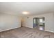 Open living room with view of updated kitchen at 3060 S Shortridge Rd, Indianapolis, IN 46239
