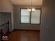 Dining area with light blue walls and dark wood flooring at 3257 Eastbrooke Ct, Indianapolis, IN 46235