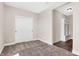 Spacious bedroom with plush carpeting and sliding closet doors at 482 Chester Ln, Pittsboro, IN 46167