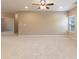 Large living room with ceiling fan and carpet at 7515 Sunset Ridge Pkwy, Indianapolis, IN 46259