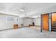 Large basement area with carpeted floor, ideal for recreation or storage at 807 Alden Dr, Fortville, IN 46040