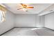 Bright bedroom featuring a ceiling fan and carpet at 807 Alden Dr, Fortville, IN 46040