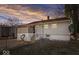 House exterior with backyard patio at sunset at 807 Alden Dr, Fortville, IN 46040