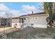 House exterior showcasing a backyard patio and landscaping at 807 Alden Dr, Fortville, IN 46040