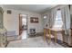 View from kitchen to dining area with table and chairs at 917 Garfield St, Lebanon, IN 46052